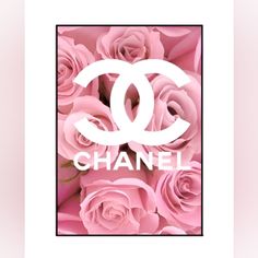 pink roses with the word chanel on it in front of a black and white frame