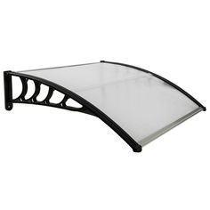 a black and white photo of a curved glass table top with metal support bars on each side