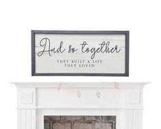 a fireplace with a sign above it that says, and so together they built a life they loved