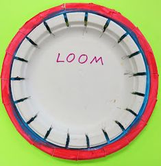 a paper plate with the word loom written on it