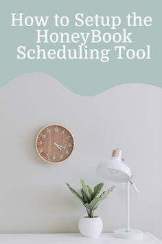 a white desk with a clock on it and the words how to setup the honey book schedule