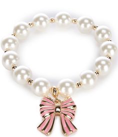 From Southern Living&#x2C; this bracelet features:Stretch braceletGold tone hardwareStretch&#x2C; no closureApprox. 2.5" diameterImported. Bow Charm, Bracelet Inspo, Gold Bracelets, Pearl Jewellery Earrings, Southern Living, Dillard's, Dog Collars, Pink Bow, Stretch Bracelet