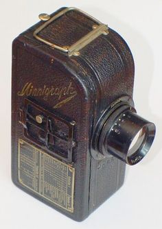 an old fashioned camera on a white background