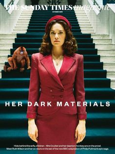 the poster for her dark materials shows a woman in a red suit standing on stairs