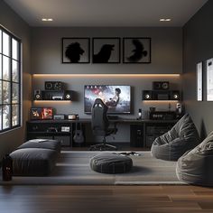 a living room filled with lots of furniture and a flat screen tv mounted to the wall