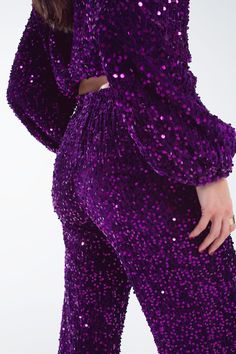 Add a touch of glamour to your party wardrobe with our Purple Wide Leg Sequin Pants, a must-have for those who love to stand out. All-Over Sequin Embellishment: These pants are adorned with shimmering purple sequins, providing a luxurious and eye-catching look perfect for any festive occasion. Elegant Wide-Leg Design: The flowy wide-leg style not only offers a modern and trendy look but also ensures comfort and freedom of movement. Convenient Side Pockets: The inclusion of side pockets adds a pr Purple Wide Leg, Sequin Suit, Tan Scarf, Sequin Pants, Chic Party, Life Of The Party, Comfy Pants, Medium Purple, Stylish Shirts