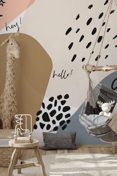 a child's room with a giraffe wall mural and hammock chair