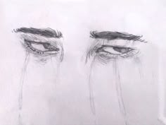 a pencil drawing of two eyes with their lids closed