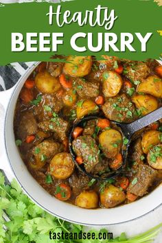 beef stew with carrots and potatoes in a white bowl on top of a table