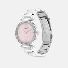 Timeless and elegant the Cary watch is a sophisticated style perfect for day or night. The sleek stainless steel bracelet design features a luminous mother-of-pearl Signature dial detailed with a shimmering crystal bezel. It’s finished with a crown cabochon. | Coach Cary Watch, 34 Mm - Women's - Stainless Steel/ Pink Elegant Coach Jewelry With Polished Finish, White Gold Watches With Rotating Bezel, Luxury Coach Watches With Diamond Hour Markers, Timeless Silver Coach Jewelry, Luxury Silver Coach Watch, Elegant Coach Watch With Polished Finish, Elegant Silver Coach Watch, Coach Jewelry With Diamond Hour Markers, Coach Watches Women