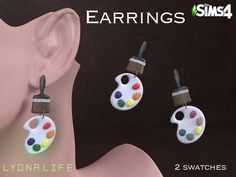 the earrings are painted with different colors and shapes