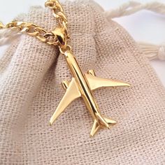 ★ Airplane Pendant ★  A beautiful handcrafted passengers Airplane pendant/necklace for Men and Women. * Materials/Finishes ➤ Silver 925 ➤ 24K Gold Plated over Silver 925 ➤ 14K Rose Gold Plated over Silver 925 * Dimensions ➤ 3.1 x 3.0 x 0.9 cm (~ 1.2 x 1.2 x 0.3 inches)/Bail: Suitable for up to 3.0 mm (~ 0.1 inches) Chain * Weight: ~ 5 grams (in Silver 925) ----------------------------------------------------------------------------- IMPORTANT NOTES: ----------------------------------------------------------------------------- ➤ When buying from Gold and Silver Designs you will also receive as a gift: ✔ A Silver/Gold/Rose Gold Color Steel Chain ✔ Free Shipping Worldwide (Standard Shipping Option) ✔ A discount coupon code for -25% on your next order ✔ A beautiful Bag to store your precious j Gold Necklace Men, Aviation Jewelry, Airplane Pendant, Pentagram Pendant, Necklace Men, Precious Jewels, Gold Necklace Women, Evil Eye Pendant, Necklace For Men