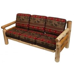 a couch made out of logs and fabric with deers on the back, sitting in front of a white background