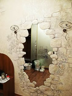 a mirror that is on the side of a wall