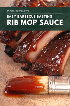 baked barbecue ribs with bbq sauce and a brush