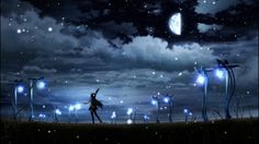 a person standing in the middle of a field under a night sky filled with stars