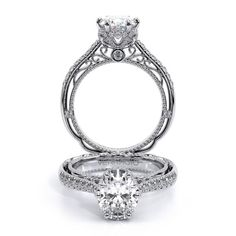 a diamond engagement ring on top of a white background