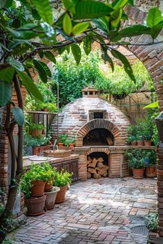 an outdoor pizza oven surrounded by potted plants