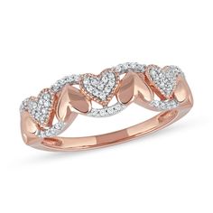 Imagine yourself in a cute look - this adorable diamond alternating heart ring in rose gold. Fashioned in precious 10K rose gold Heart-shaped diamond composites alternate with polished hearts along the open center. Diamonds shimmer along the scalloped borders. This ring shines with 1/6 ct. t.w. of diamonds. Cutwork Saree, Gold Finger Rings, Valentine Collection, Engagement Rings Twisted, Heart Rings, Gold Book, Heart Stone, Peoples Jewellers, Rose Gold Heart