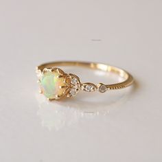 Leaf SI Clarity Diamond Ring, 6mm Opal Milgrain Ring, 14k Yellow Gold Gemstone & Opal Ring, Engagement Stackable Ring, Christmas Gift Fine Handmade Jewelry. This ring set is an ORIGINAL DESIGN by TheFourSquare 14K Gold Ring, Studded Ring, Dainty Wedding Ring, Opal Engagement Ring, Gemstone Ring For Her, Triangle Ring, 14k Gold Ring, Band Ring ★Details 14k Yellow Gold Main gemstone: Opal  Shape: Round Stone Size : 6mm Ring Size ; US 7 SI Clarity Diamond, Natural Quality: SI quality, conflict-free Gold Opal Ring For Anniversary, Gold Opal Round Cut Ring For Anniversary, Gold Opal Ring For Anniversary With Round Cut, Gold Opal Ring With Halo Design, Anniversary Opal Birthstone Ring, Gold Opal Birthstone Wedding Ring, Heirloom Style Opal Promise Ring With Round Cut, Heirloom Opal Promise Ring Round Cut, Stackable Yellow Gold Opal Ring For Anniversary