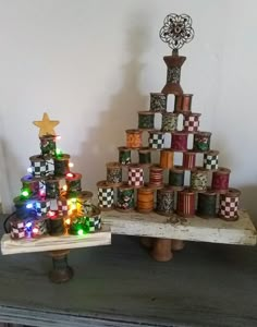 a christmas tree made out of many different types of ribbons and tinsels on a table