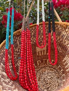 Introducing our exclusive Native American Coral and Pearl heishi necklace, a radiant embodiment of tradition and craftsmanship. This captivating piece features a seamless blend of warm coral stones with the timeless elegance of pearls, meticulously handcrafted by a skilled Native American female artisan from the Santo Domingo Pueblo. The necklace's design symbolizes the fusion of cultural richness with contemporary elegance. Each stone is meticulously chosen and arranged, showcasing the artistry Artisan Coral Beaded Necklace Handmade, Handmade Artisan Coral Beaded Necklaces, Necklace With Colorful Round Beads For Traditional Ceremonies, Artisan Handmade Coral Beaded Necklace, Artisan Beaded Necklaces For Traditional Ceremonies, Traditional Handwoven Jewelry With Round Beads, Spiritual Beaded Jewelry For Traditional Ceremonies, Traditional Handwoven Round Bead Jewelry, Artisan Red Coral Necklace With Large Beads