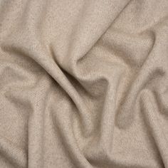 Master the art of looking good despite the cold with this Beige and Cream Herringbone Brushed Wool Blend Twill Coating, displaying a beige and cream herringbone pattern across its fuzzy, slightly tactile face and reverse. It features a subtle luster and a malleable drape. A lining will increase warmth and structure but is not necessary.

An easy way to elevate your look while staying warm, high-quality wool outerwear brings a chic maturity to your street, corporate, or formal style. The impact of a wool coat—be it oversized, fitted, wrap-around, or trench—is timeless, promoting practical fashion through a heavyweight feel. Though the wind is sharp, you’ll suddenly find yourself eager to walk the cold city streets in your new winter staple... (thank you, Mood!) Mood Designer Fabrics, Twill Coat, Practical Fashion, Mood Fabrics, Stripe Silk, Diagonal Stripes, Looking Good, Herringbone Pattern, Formal Style