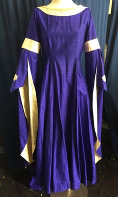 The dress in these pictures is ready to ship right away.  It has a maximum 41" bust and 30" waist. It was used in one performance  of Camelot, and has been dry cleaned, so there is a discount if this one fits you. These tend to look best if you have a little wiggle room.  This is not stretchy, and it does not lace up the back, so please check your measurements before you order. Other sizes and styles, or an exact replica of this one, are available as a custom order which takes 6-8 weeks. We will Elegant Floor-length Dress For Cosplay, Medieval Dress Pattern, Court Dresses, Dupioni Silk, Womens Costumes, Tulip Design, Medieval Dress, Saint Paul Mn, Measurement Chart