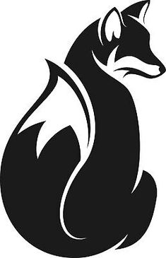 a black and white image of a fox sitting down with its head turned to the side