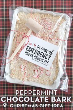 peppermint chocolate bark christmas gift idea in a bag on a plaid tablecloth