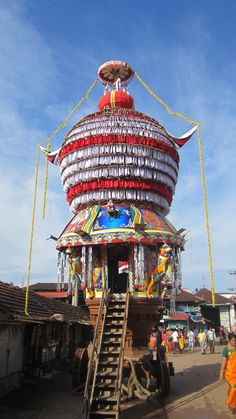 an elaborately decorated building with stairs leading up to it's top and bottom