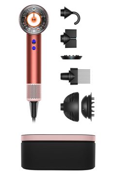 What it is: Special edition Dyson Supersonic Nural hair dryer in strawberry bronze and blush pink with complimentary Presentation case. What it does: A network of Nural sensors automatically adjusts airflow and temperature to enhance natural shine and protect scalp health.¹ It protects your scalp barrier from extreme heat, helping to maintain your scalp's moisture levels. Learns and remembers your styling routine and automatically adjusts to your go-to airflow and heat settings as you style. Machine knows when you've paused styling, simply put machine down to pause heat and airflow while styling.Features and benefits:- A new network of Nural sensors within the machine activate intelligent features automatically to optimize your styling routine.- Scalp protect mode automatically adjusts air Dyson Diffuser Curls, Pink Dyson, Diffuser Curls, Curl Diffuser, Dyson Hair Dryer, Dyson Supersonic, Hair Diffuser, Waves Curls, Hair Styling Tools