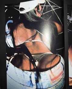 an open book with two pictures of women wearing sunglasses and one has her hair pulled back