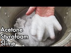 a person is washing their hands in a bucket with some white powder on it and the words acetone styrofoam slime