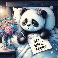 a panda bear sitting on top of a bed holding a sign that says get well soon