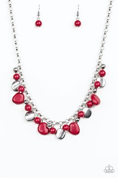 Featuring round and asymmetrical shapes, shiny silver and red beads swing from the bottom of a bold silver chain. Red Necklace Set, Asymmetrical Shapes, Pink Jewels, Red Beads, Red Necklace, Paparazzi Accessories, Blue Gems, White Rhinestone, Paparazzi Jewelry