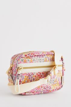 In sprays of vibrant florals, the Affinity Ditsy Utility Crossbody Bag by Cath Kidston is a joyful addition to your everyday wardrobe. Crafted from TPU cotton, this camera bag silhouette features top zip closure, inner zip pocket, handy outer zip and adjustable webbing crossbody strap with webbing detail to face. The perfect piece to start your Cath collection with. Height 13cm Width 18cm Depth 6.5cm Shell 52% Cotton, 43% Jute, 5% TPU. Lining 100% Cotton. Pocket Cross, Bag Silhouette, Vibrant Florals, Body Camera, Web Detail, Cath Kidston, Cute Bags, Cute Fits