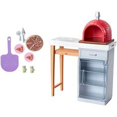 a toy oven and table with pizza on it