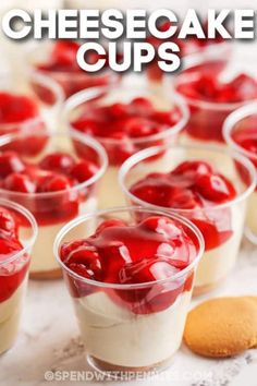 small cups filled with desserts sitting on top of a table