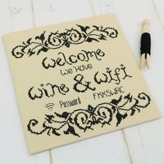 a cross - stitch pattern with the words welcome, we have one & curl written on it