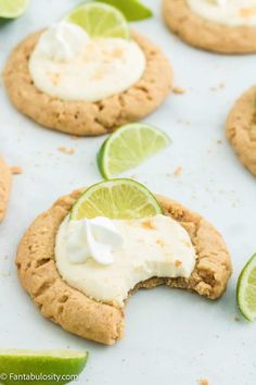 cookies with limes and whipped cream on them