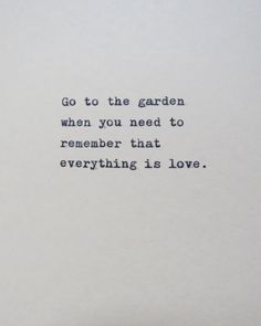 an old typewriter with the words go to the garden when you need to remember that everything is love