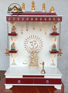 the shrine is decorated with gold and white decorations