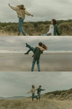 two people are playing on the beach and one is jumping in the air with his arms out