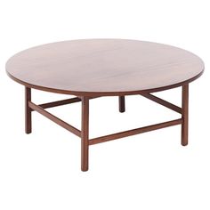 a round wooden table with two legs and a wood frame on the bottom, against a white background