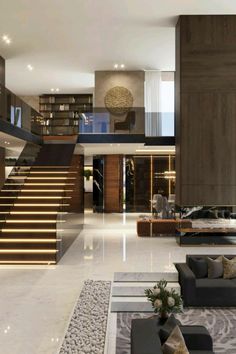 a living room filled with furniture next to a staircase