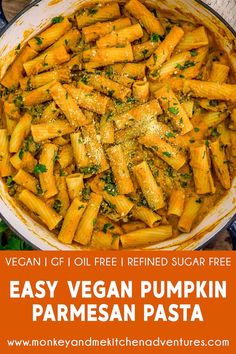 vegan pumpkin parmesan pasta in a pan with the title text overlay