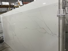 a large white marble slab in a warehouse