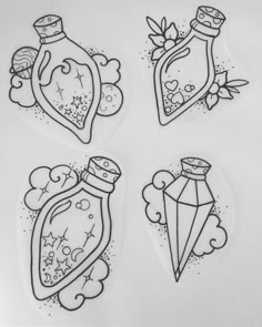 four stickers with different shapes and designs on them, one has a diamond in the middle