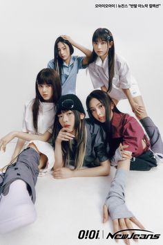 the girls are posing together in front of a white background